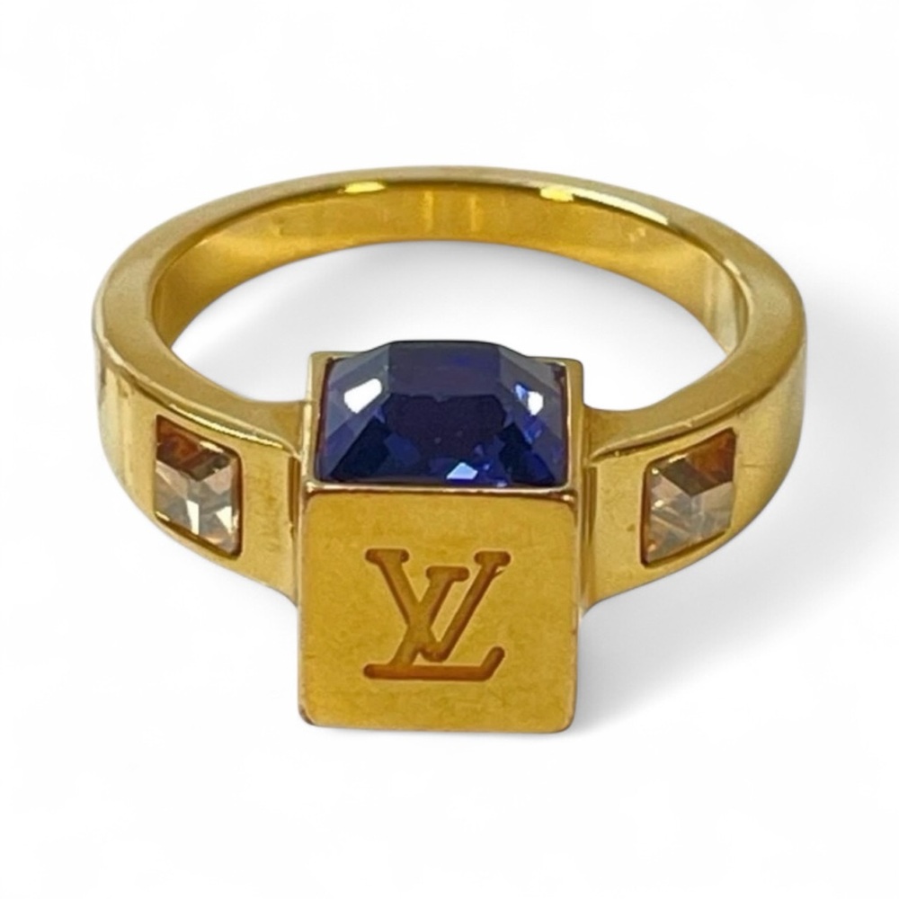 350$ Louis Vuitton Gold Ring with Sapphire Blue Gem